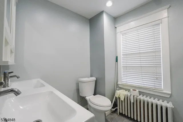 a bathroom with a sink and a toilet