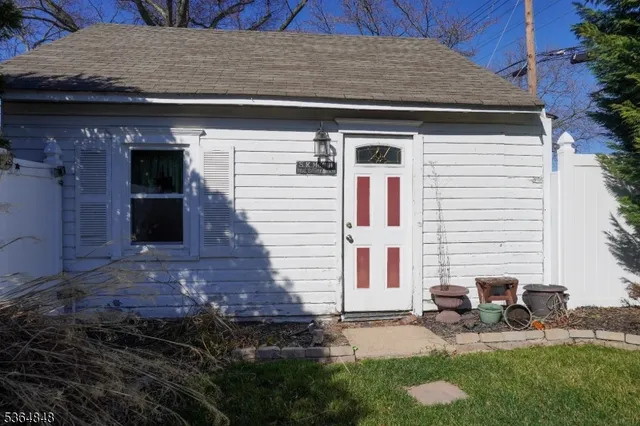 a front view of a house with patio