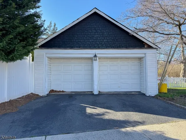 a front view of house with garage