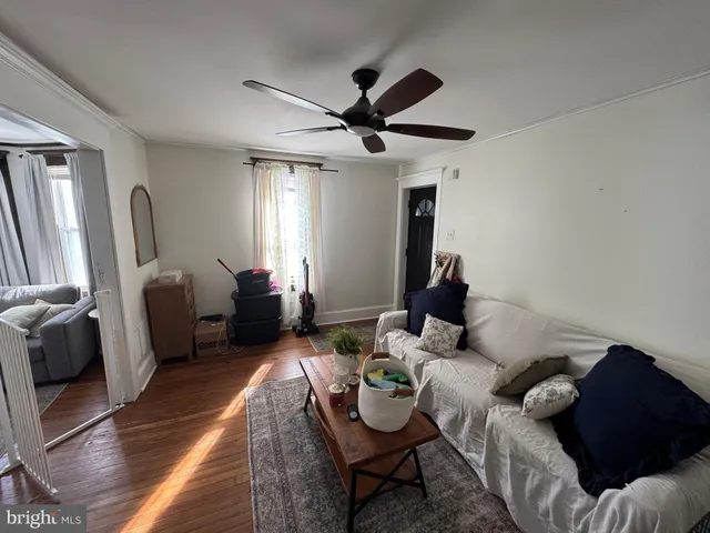 a living room with furniture and window