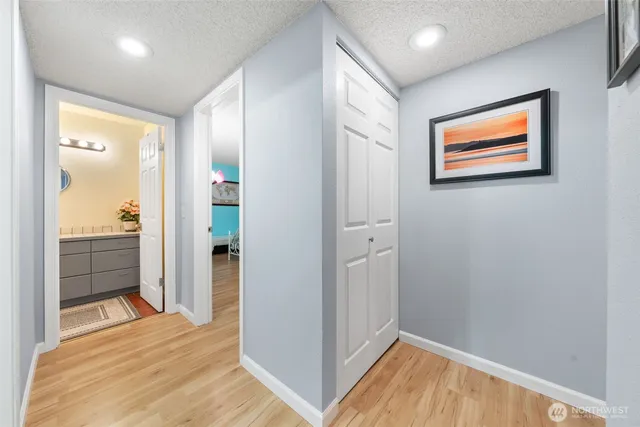 a view of a hallway with a workspace