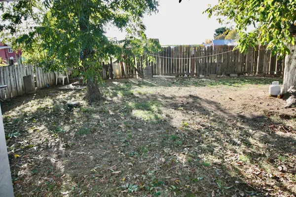 a view of a wooden fence