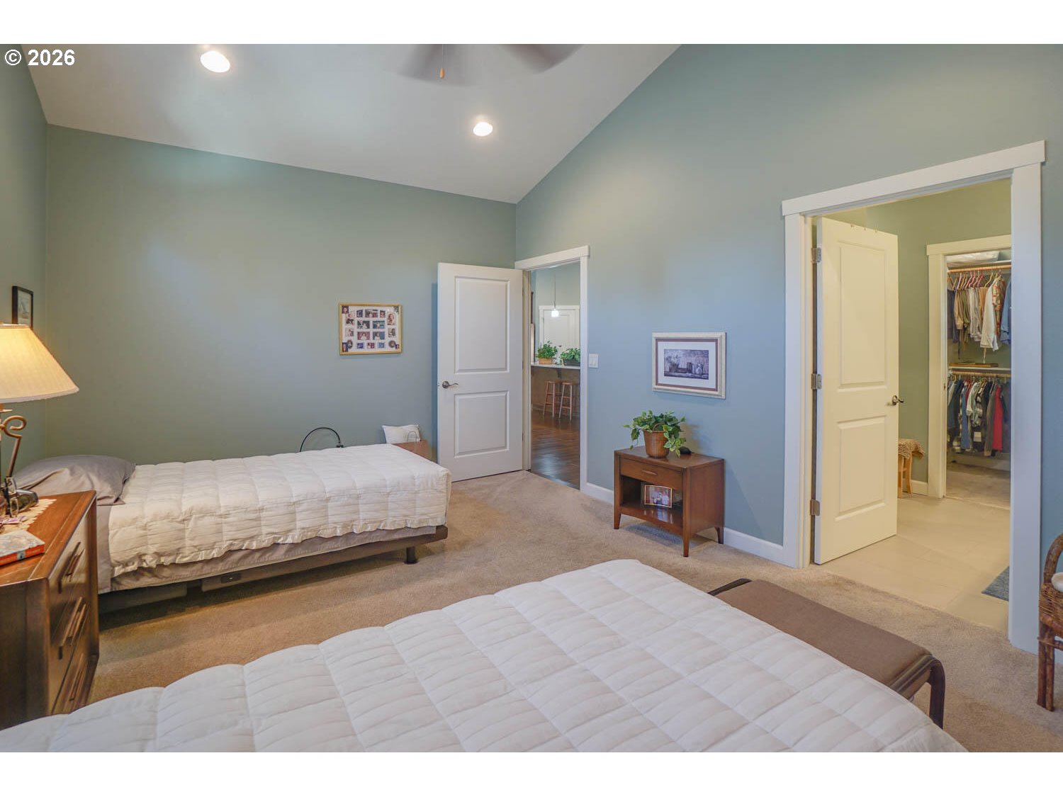 17629 Northeast 17th Avenue Ridgefield, WA 98642 - Photo 24 of 31 a bedroom with a bed and a chair