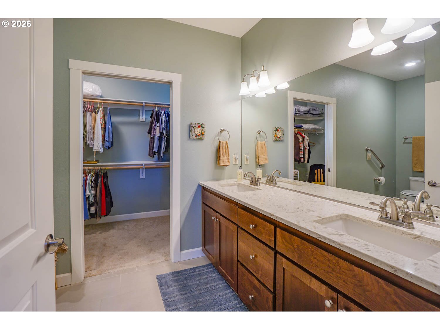 17629 Northeast 17th Avenue Ridgefield, WA 98642 - Photo 25 of 31 a bathroom with a sink double vanity and a mirror