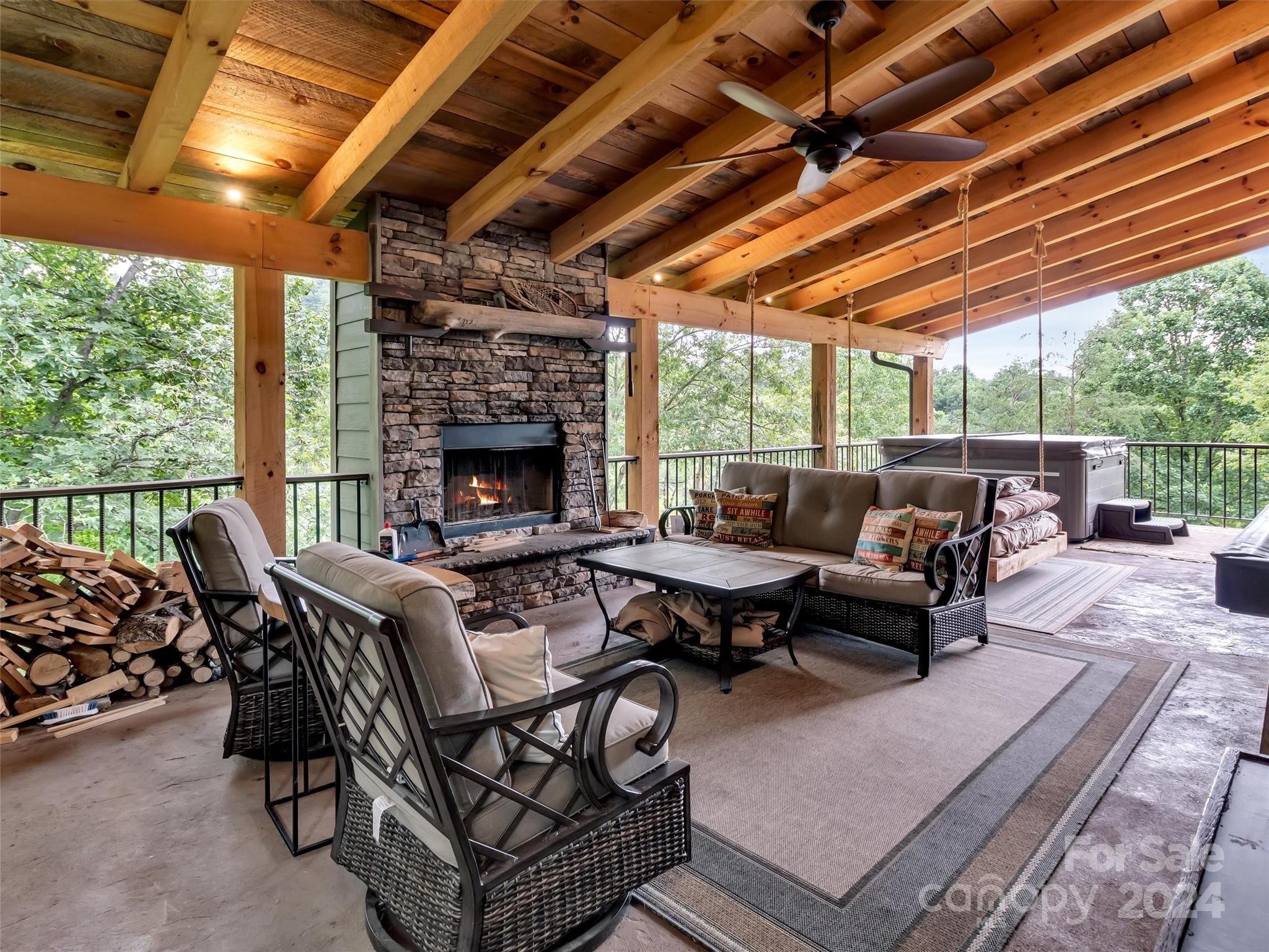 989 Ferguson Cove Loop Clyde, NC 28721 - Photo 33 of 42 a outdoor space with patio lots of furniture