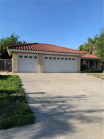 a view of a swimming pool with an outdoor space