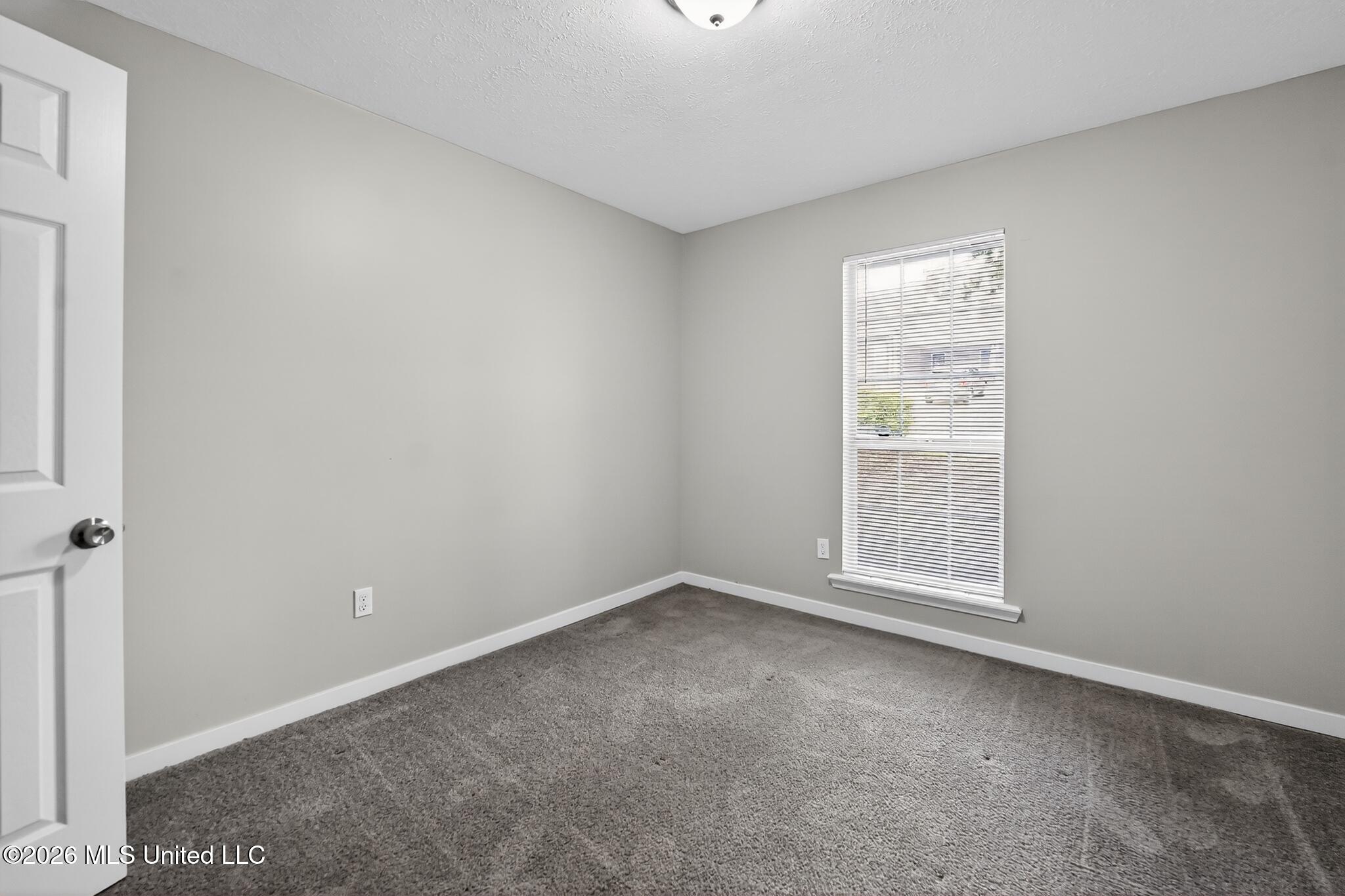 704 Dunleith Lane Ridgeland, MS 39157 - Photo 12 of 15 06_704_Dunleith_Ln-Living_room-7616