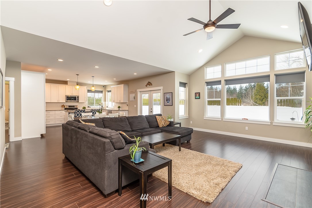 3519 McGee Road Blaine, WA 98230 - Photo 11 of 40 a living room with furniture and a large window