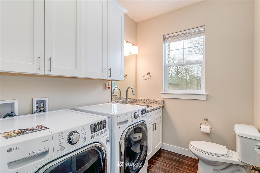 3519 McGee Road Blaine, WA 98230 - Photo 18 of 40 a utility room with dryer and washer