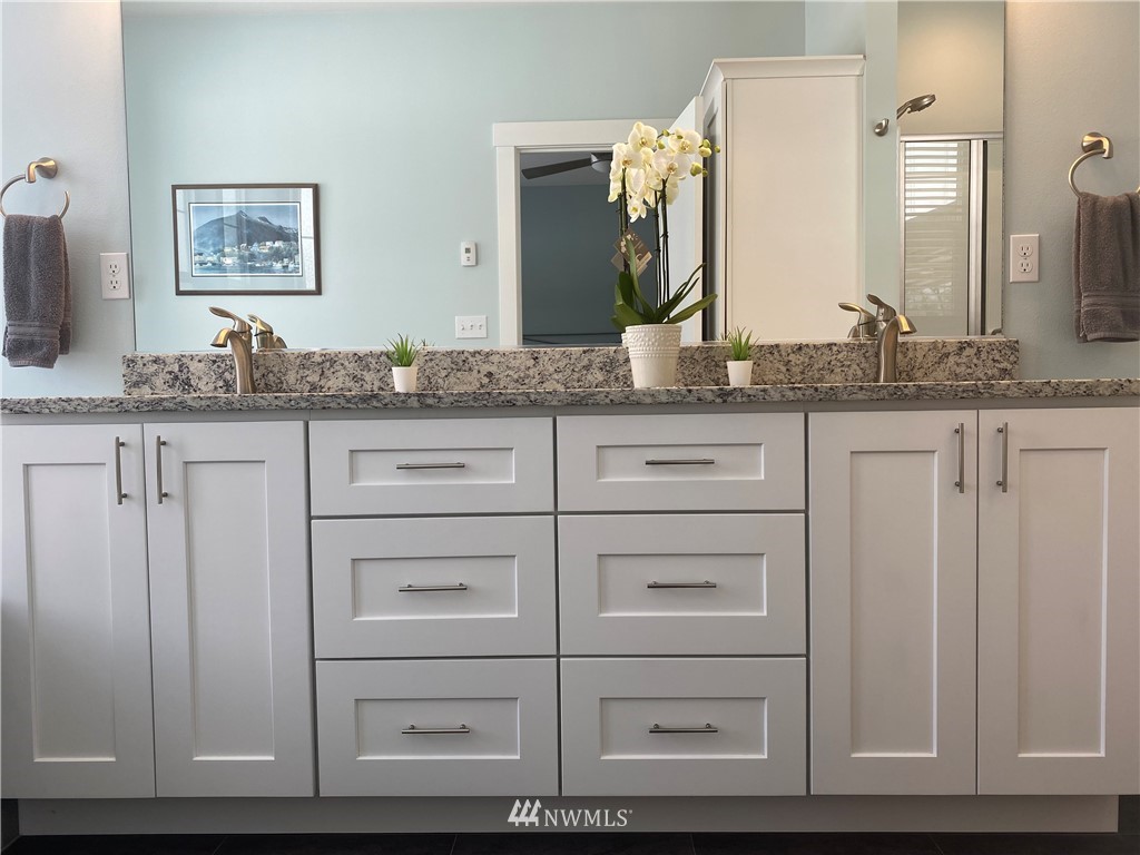 3519 McGee Road Blaine, WA 98230 - Photo 25 of 40 a bathroom with a granite countertop sink and a mirror