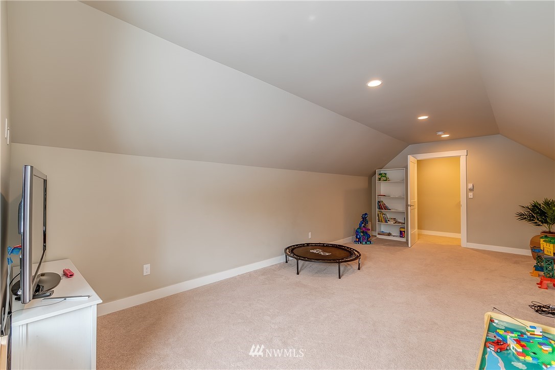 3519 McGee Road Blaine, WA 98230 - Photo 31 of 40 a room with furniture and a flat screen tv