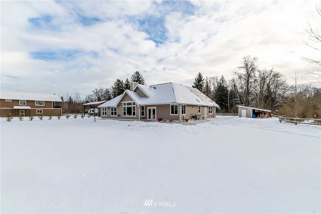 3519 McGee Road Blaine, WA 98230 - Photo 35 of 40 a view of a house with roof and sitting area