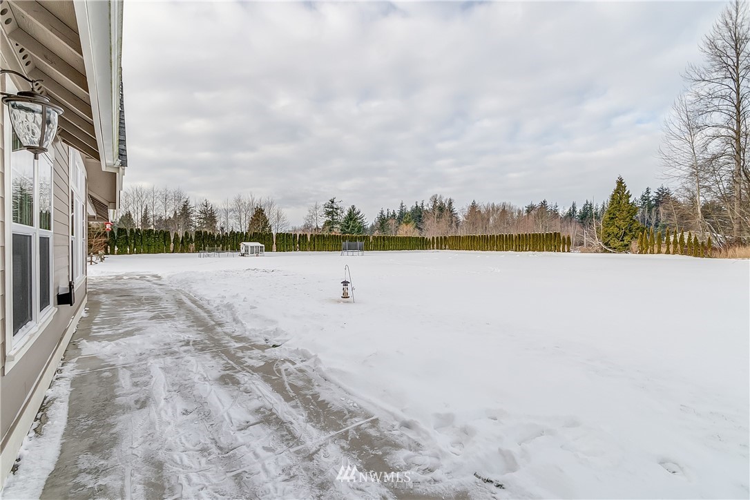 3519 McGee Road Blaine, WA 98230 - Photo 36 of 40 a view of a dry yard with wooden fence