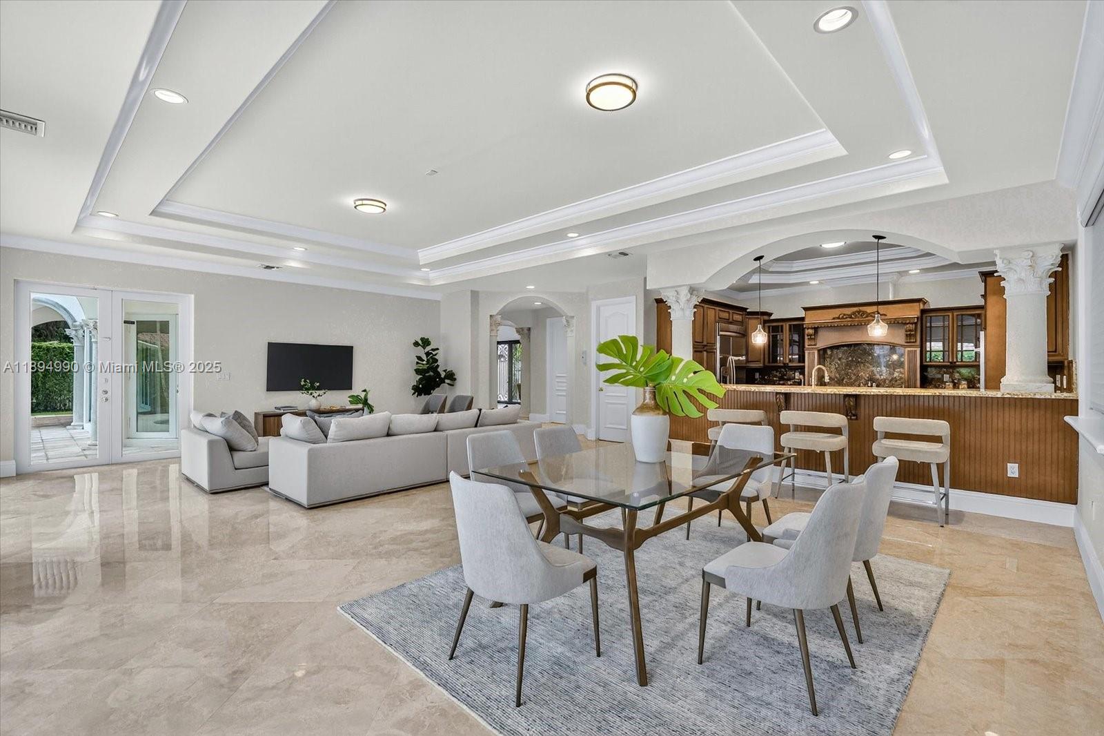 7975 Southwest 52nd Court Miami, FL 33143 - Photo 11 of 26 a living room with furniture and a flat screen tv
