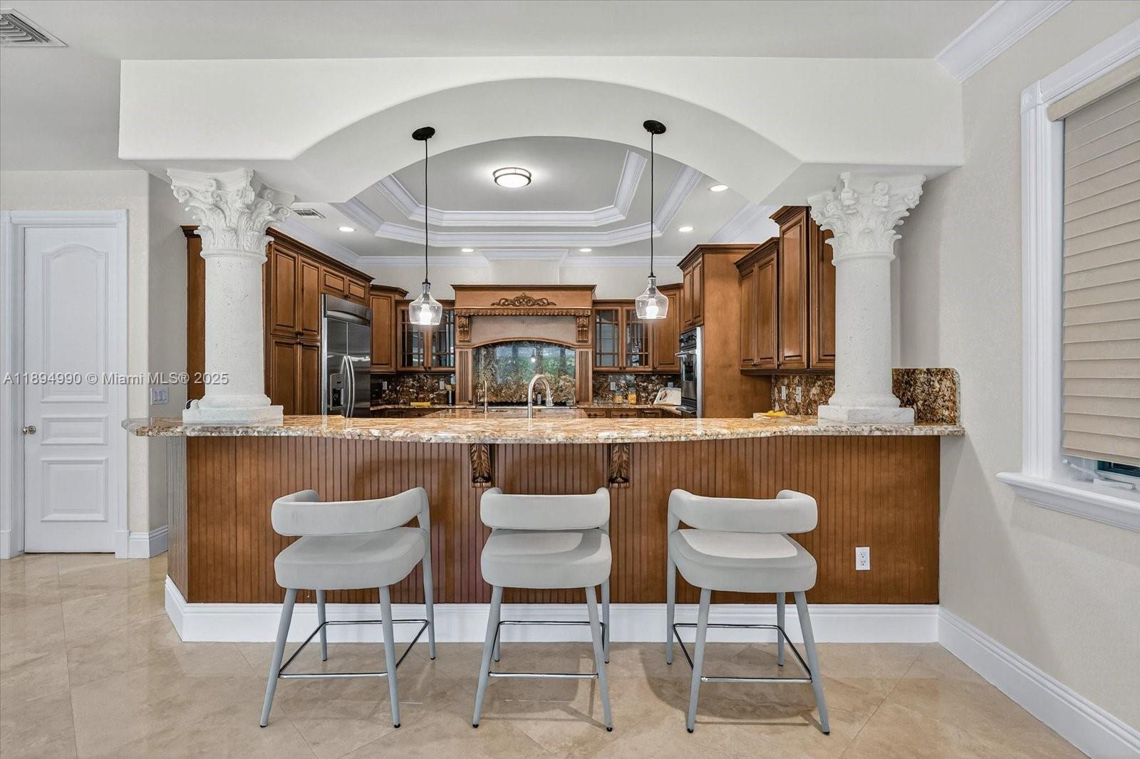 7975 Southwest 52nd Court Miami, FL 33143 - Photo 12 of 26 a kitchen with a sink cabinets and window