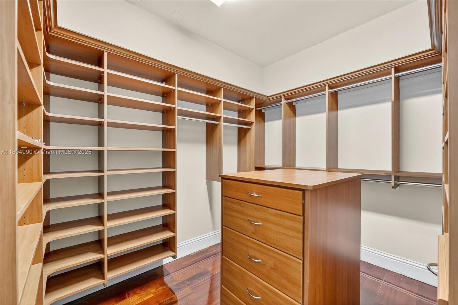 7975 Southwest 52nd Court Miami, FL 33143 - Photo 19 of 26 a view of walk in closet and bedroom
