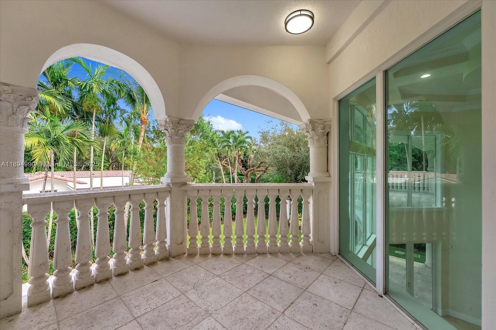 7975 Southwest 52nd Court Miami, FL 33143 - Photo 20 of 26 a view of a two chairs in the balcony