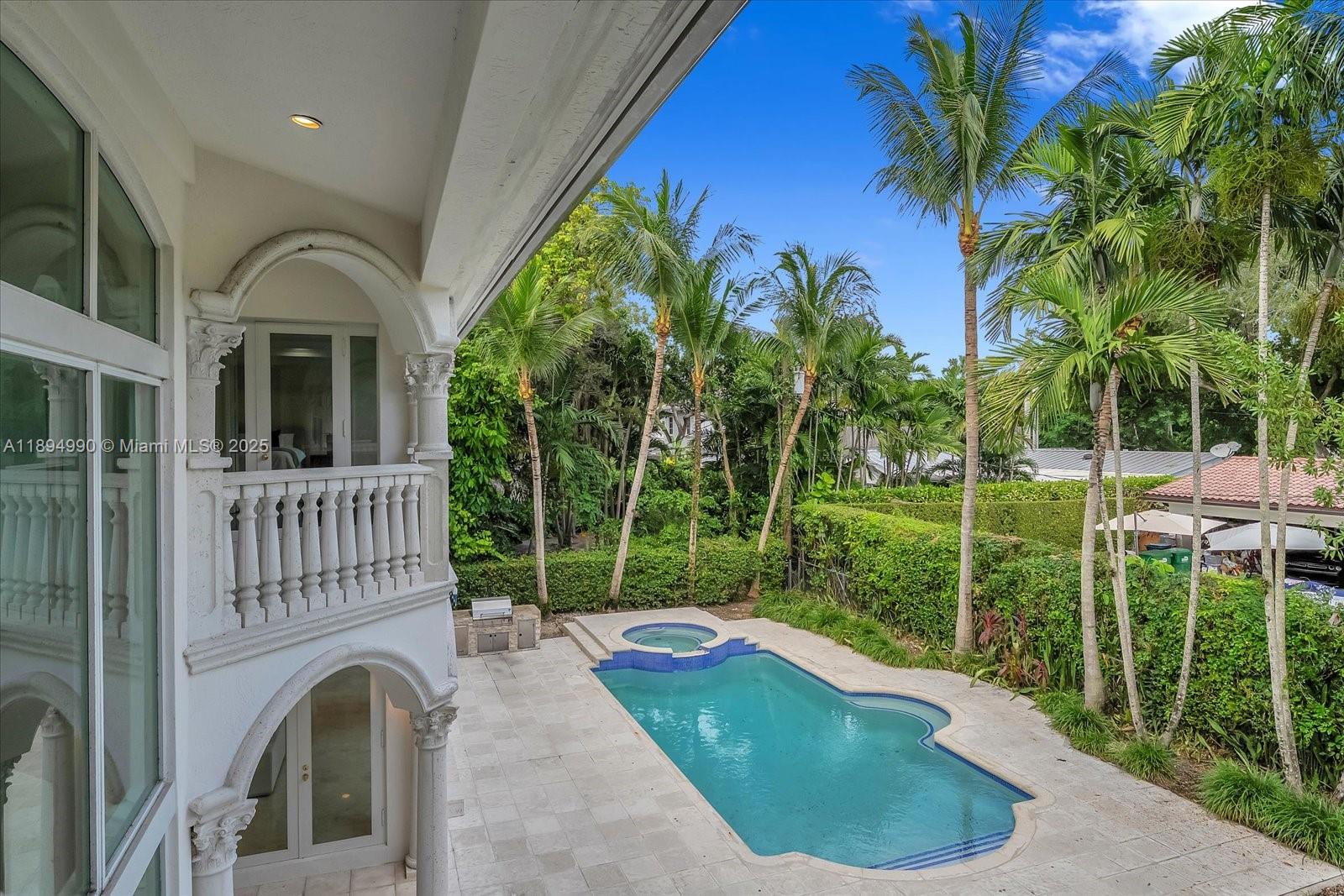 7975 Southwest 52nd Court Miami, FL 33143 - Photo 21 of 26 a view of a house with a small yard