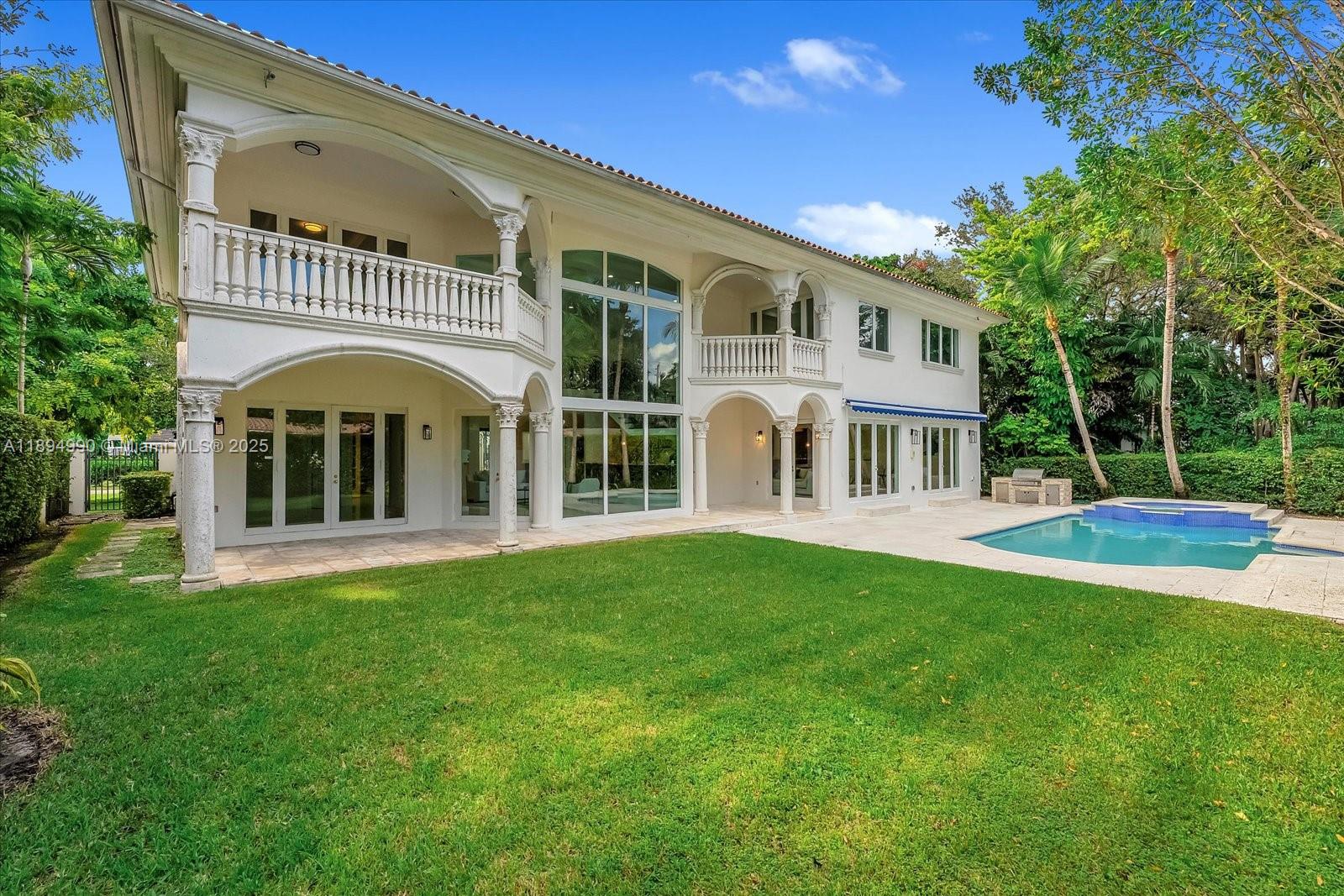 7975 Southwest 52nd Court Miami, FL 33143 - Photo 22 of 26 a view of a house with a yard