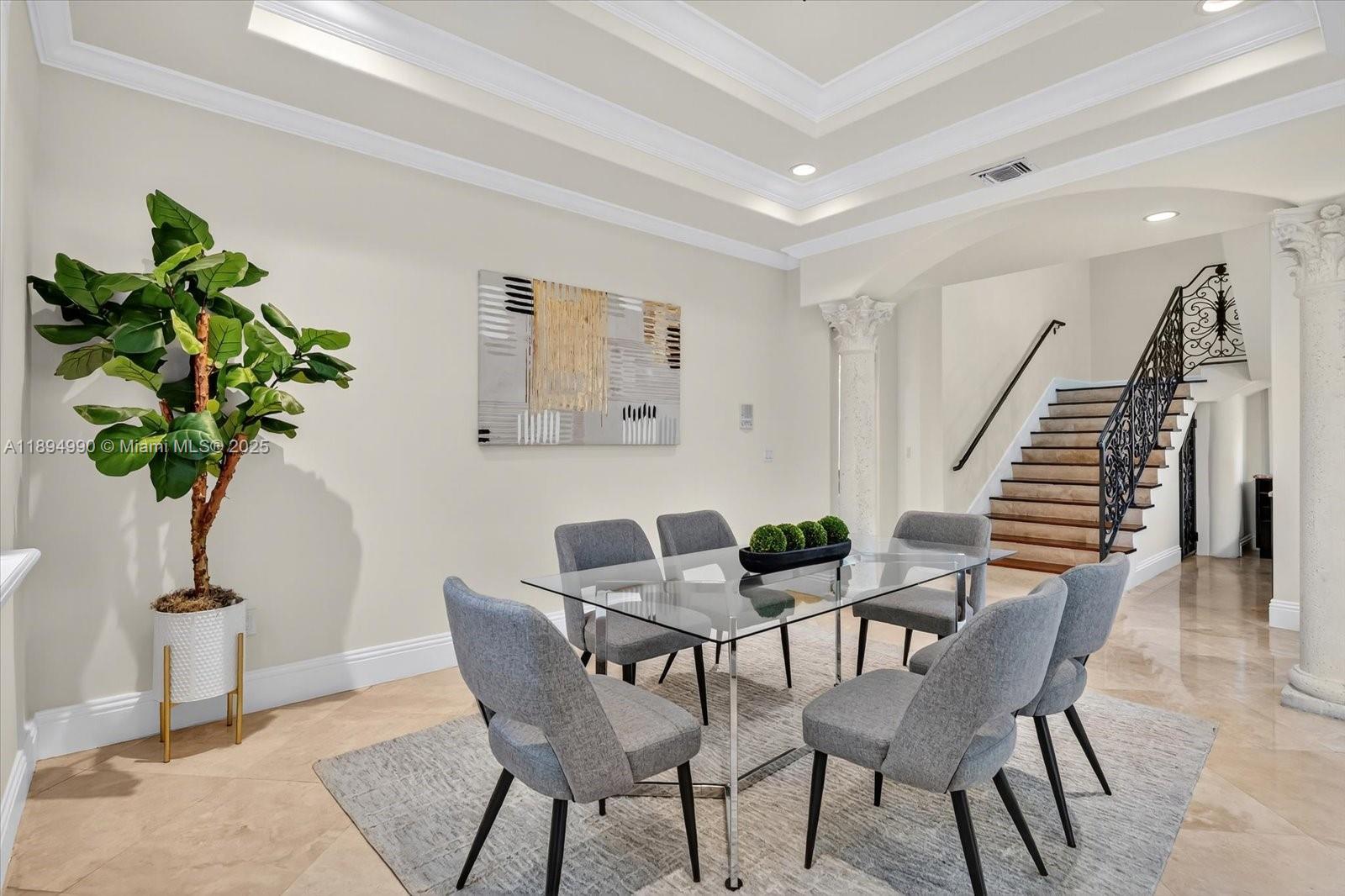 7975 Southwest 52nd Court Miami, FL 33143 - Photo 7 of 26 a view of a livingroom with furniture and a potted plant