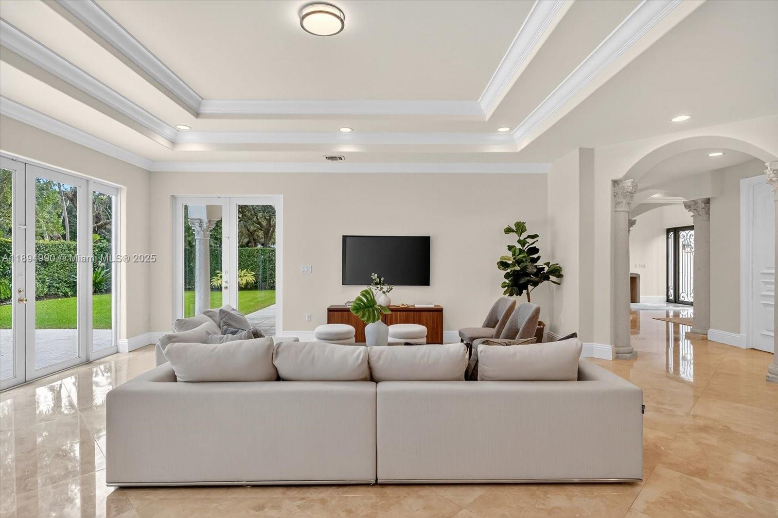 7975 Southwest 52nd Court Miami, FL 33143 - Photo 9 of 26 a living room with furniture and a large window