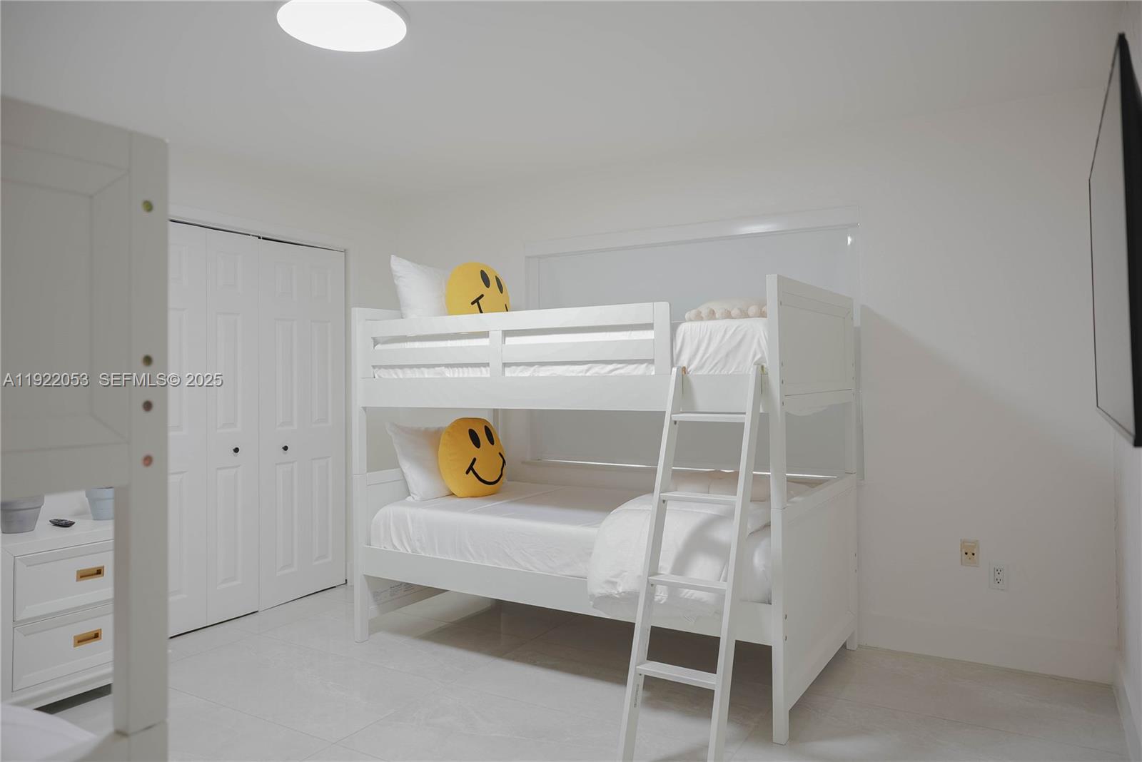 13355 Southwest 207th Avenue Miami, FL 33196 - Photo 16 of 26 a bedroom with a bed and a dresser