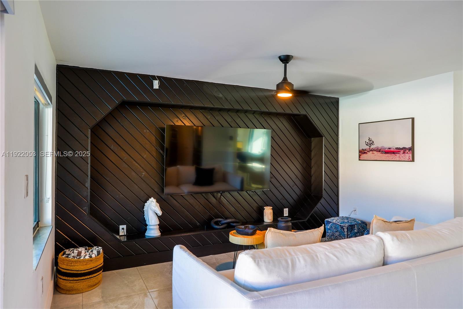 13355 Southwest 207th Avenue Miami, FL 33196 - Photo 2 of 26 a living room with furniture and a chandelier