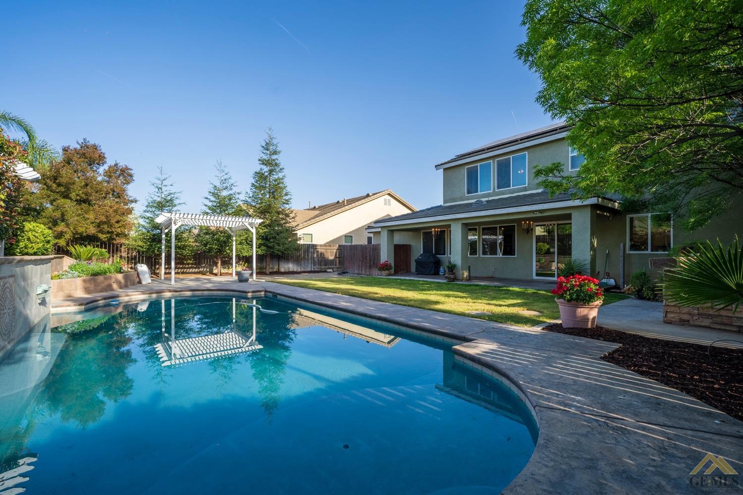 Undisclosed Address Bakersfield, CA 93312 - Photo 33 of 33 a view of house with swimming pool outdoor seating