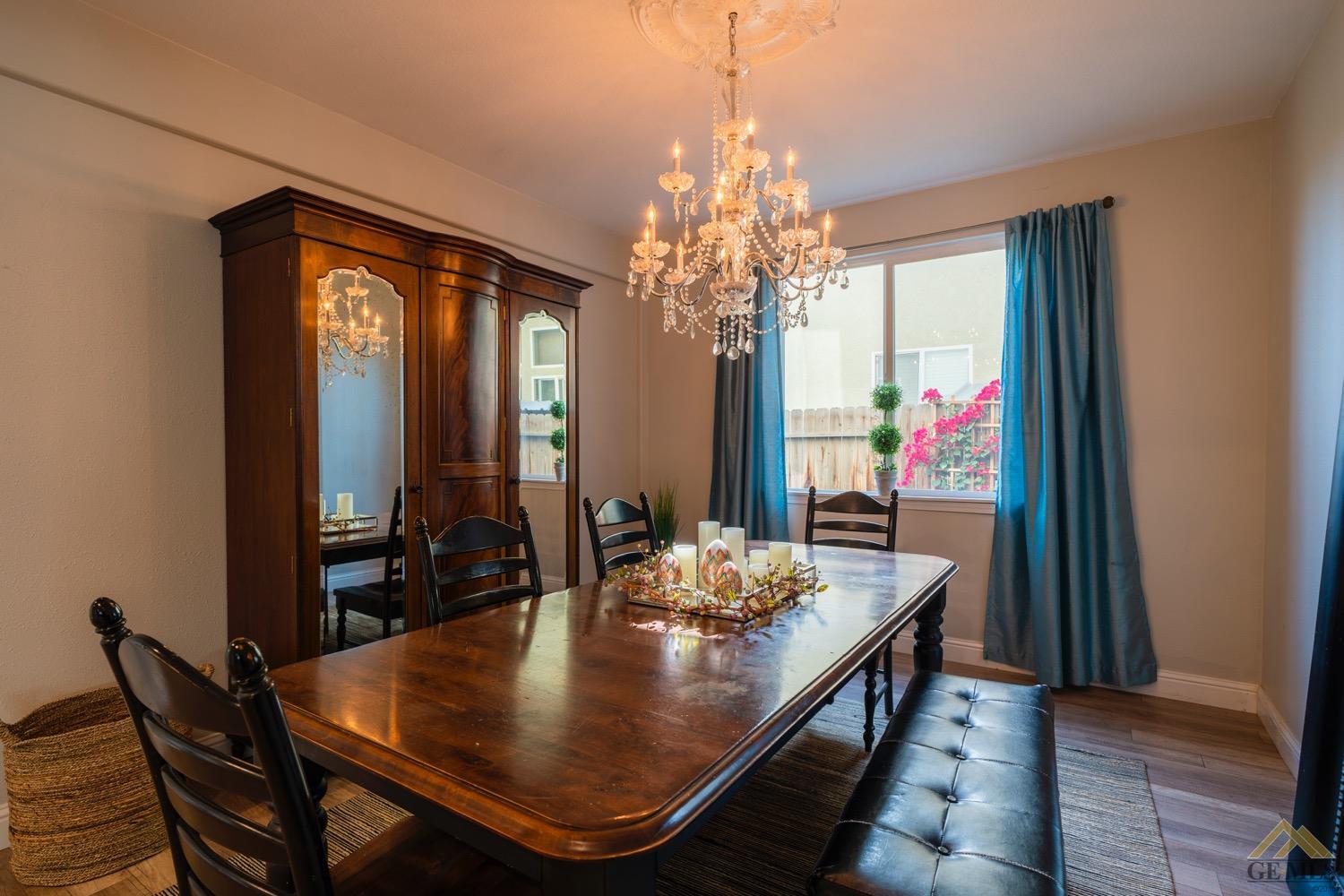Undisclosed Address Bakersfield, CA 93312 - Photo 6 of 33 a view of a dining room with furniture and window