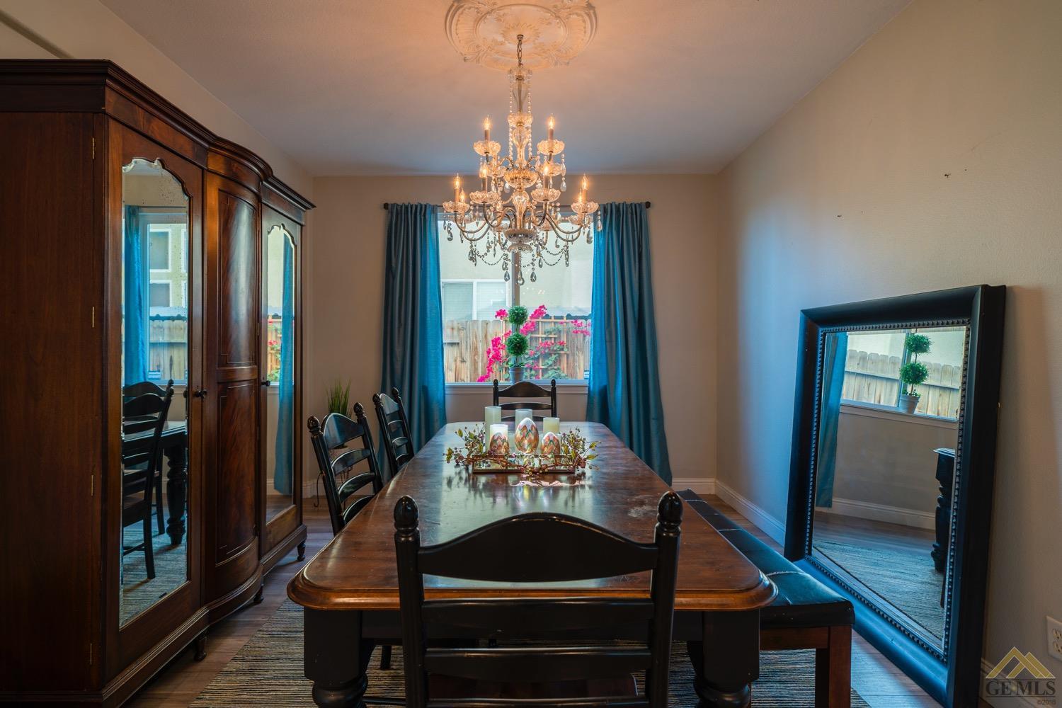 Undisclosed Address Bakersfield, CA 93312 - Photo 7 of 33 a view of a dining room with furniture and window