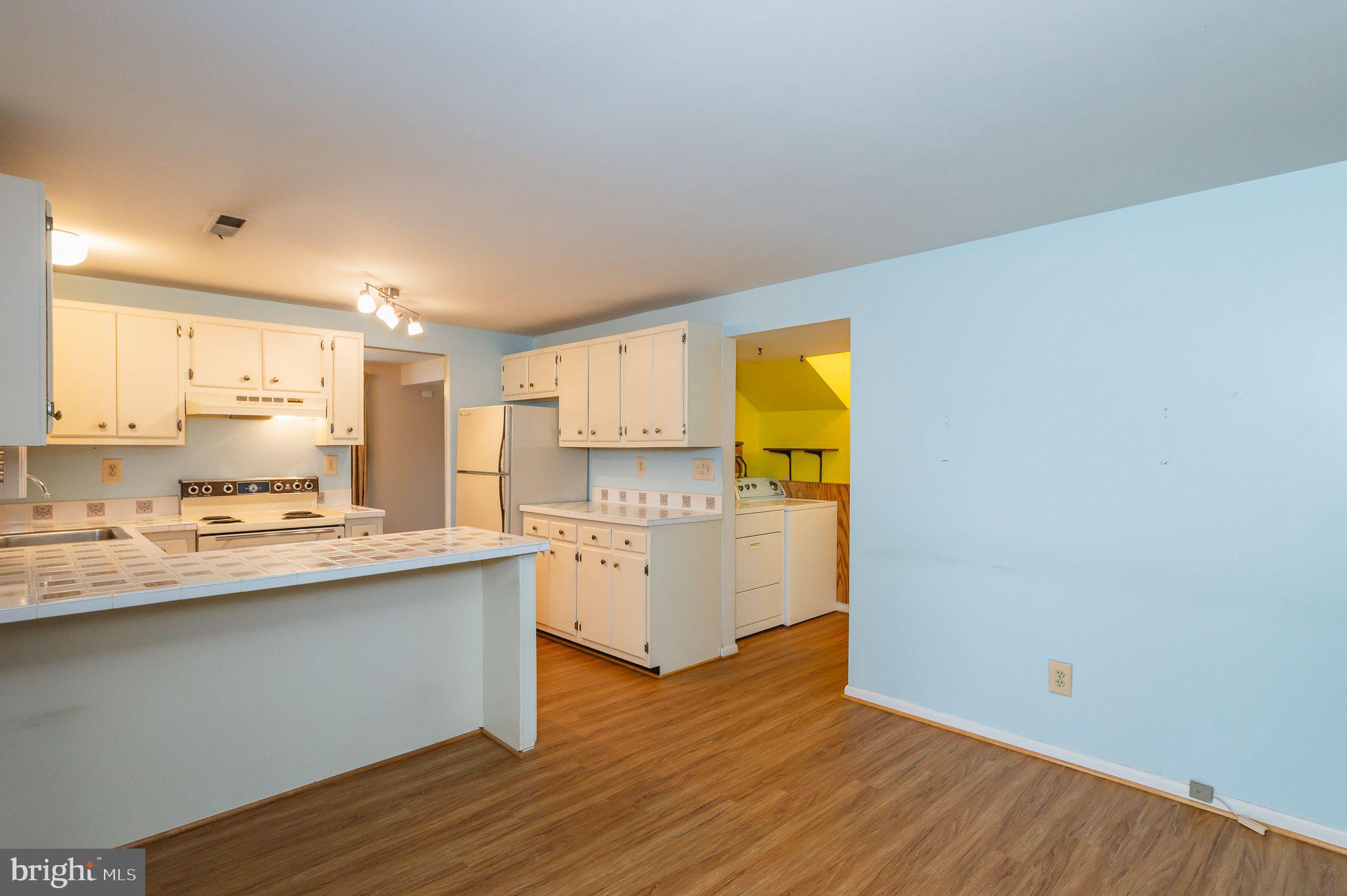 5432 Litany Lane Rosedale, MD 21237 - Photo 12 of 27 WOOD LAMINATE FLOORING