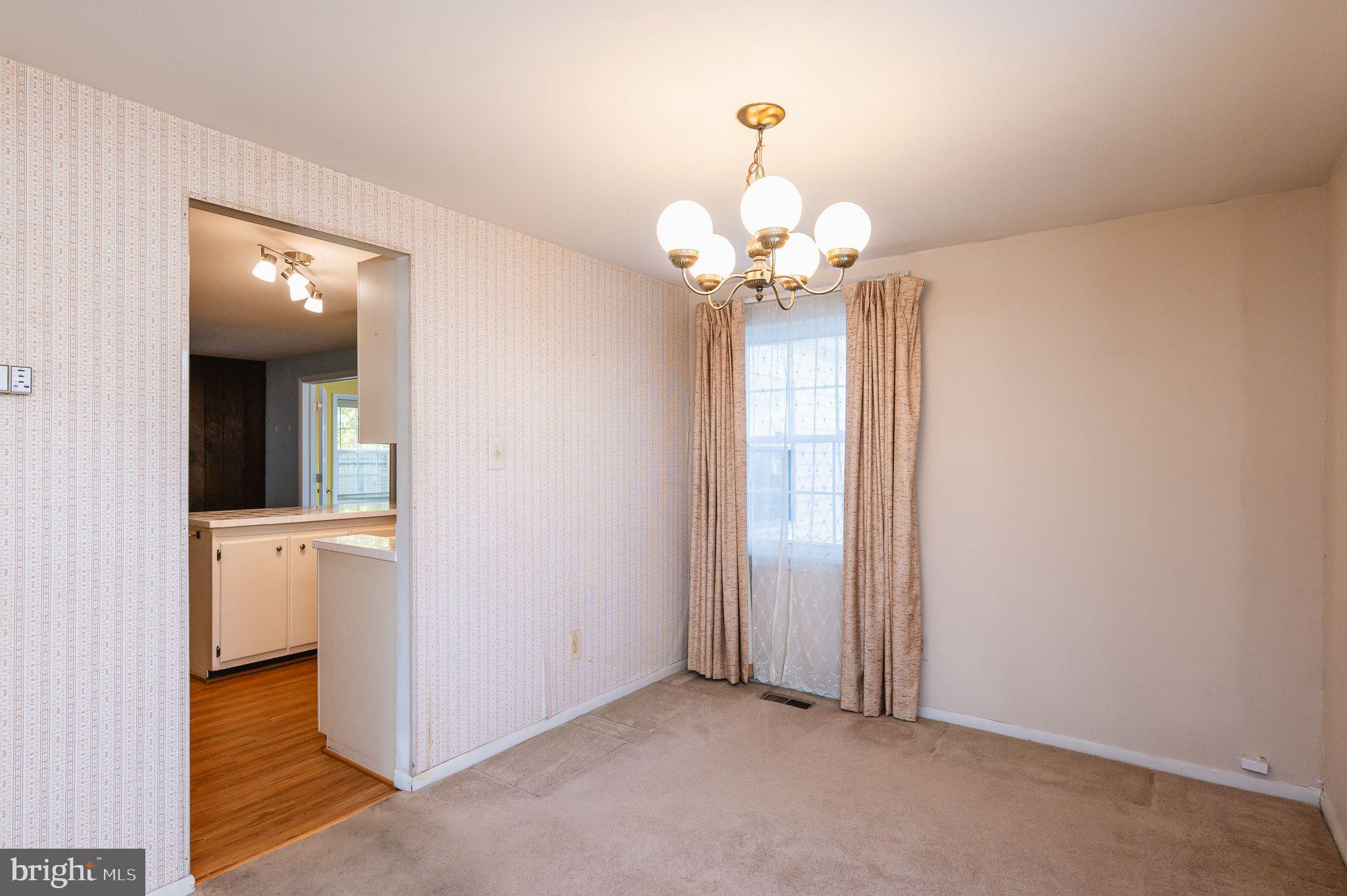 5432 Litany Lane Rosedale, MD 21237 - Photo 8 of 27 DINING ROOM INTO KITCHEN