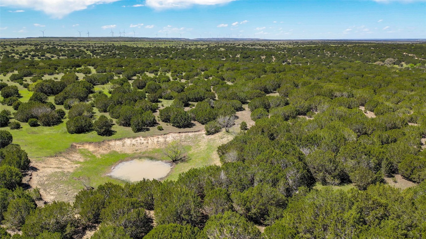 4121 County Road 2719 Evant, TX 76525 - Photo 14 of 37 a view of a lake with a city