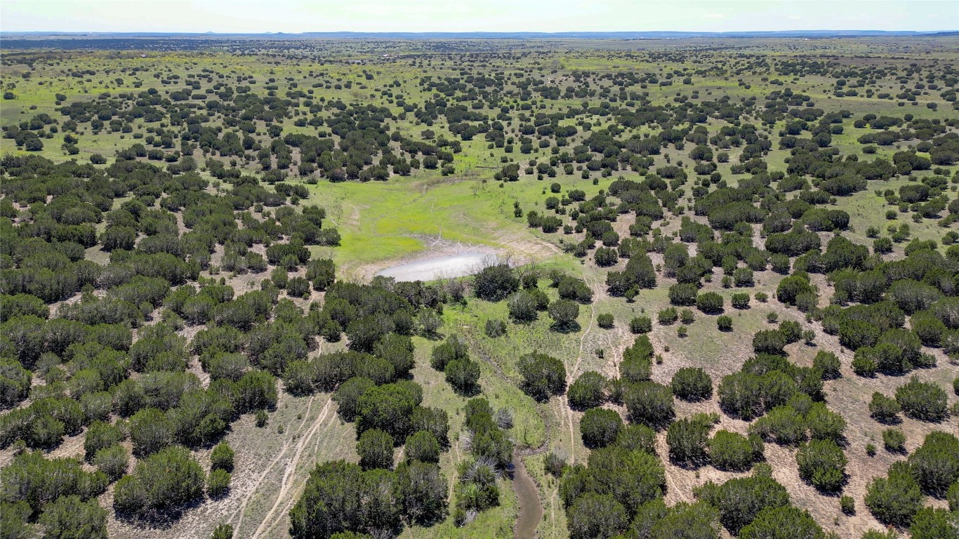 4121 County Road 2719 Evant, TX 76525 - Photo 17 of 37 a view of a city with green field