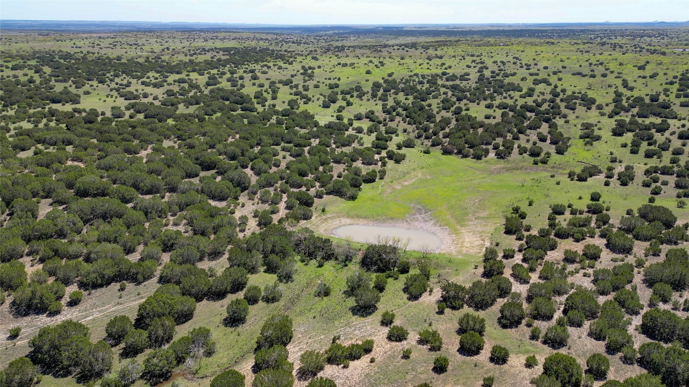 4121 County Road 2719 Evant, TX 76525 - Photo 18 of 37 a view of a field with an ocean