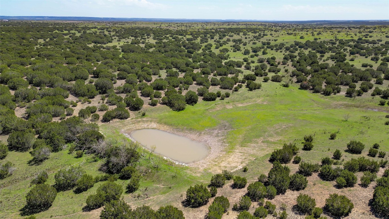 4121 County Road 2719 Evant, TX 76525 - Photo 19 of 37 a view of a field with an ocean