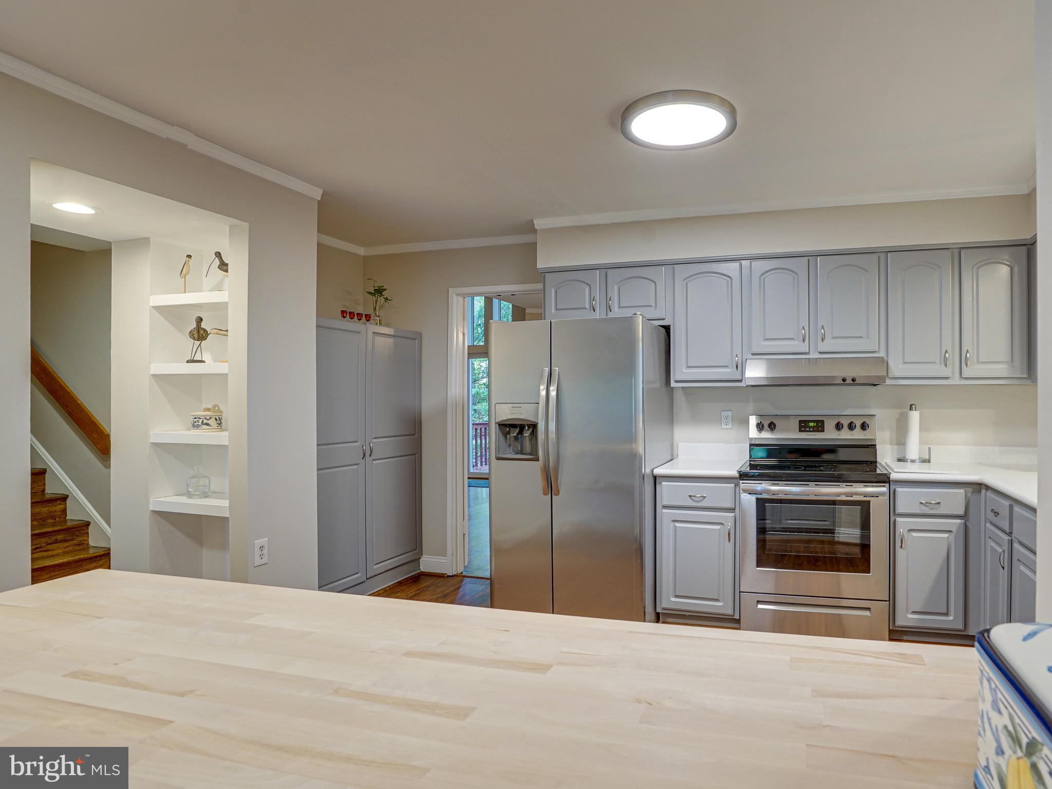 1595 Inlet Court Reston, VA 20190 - Photo 7 of 64 Kitchen with brand new butcher block island