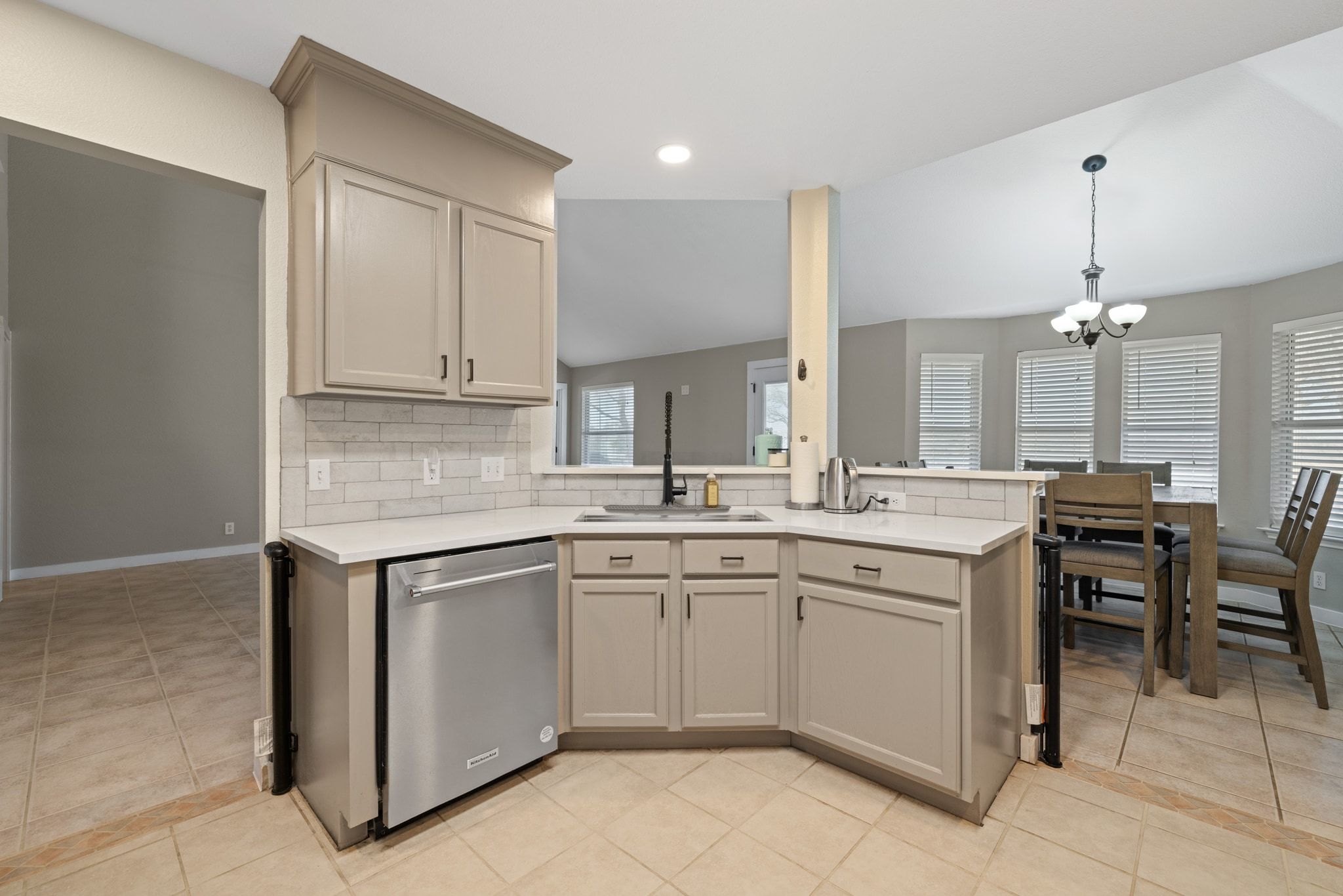 1607 Rio Bravo Loop Leander, TX 78641 - Photo 11 of 31 a kitchen with a sink and cabinets