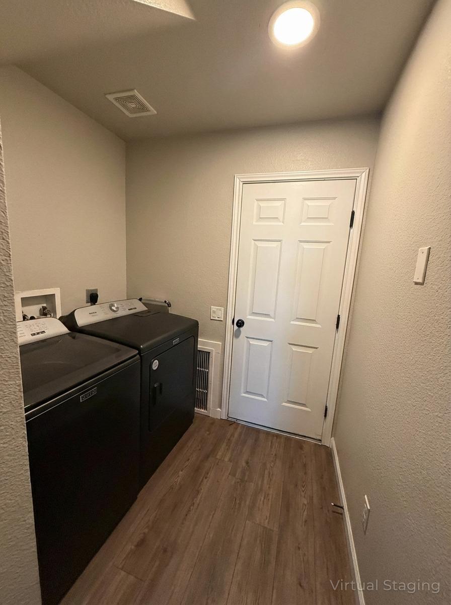 1607 Rio Bravo Loop Leander, TX 78641 - Photo 20 of 31 a view of a storage & utility room with two washing machine