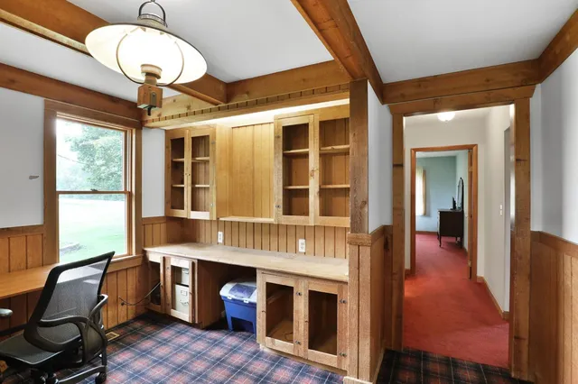 a view of a livingroom with furniture