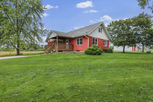 a view of a house with a big yard
