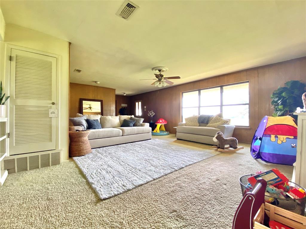 1605 Tolar Cemetery Road Tolar, TX 76476 - Photo 15 of 25 a living room with furniture rug and window