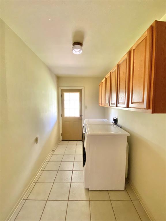 1605 Tolar Cemetery Road Tolar, TX 76476 - Photo 17 of 25 a view of a kitchen with windows