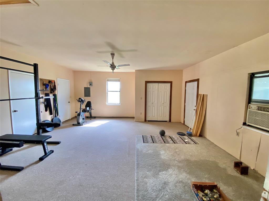 1605 Tolar Cemetery Road Tolar, TX 76476 - Photo 23 of 25 a view of a room with gym equipment