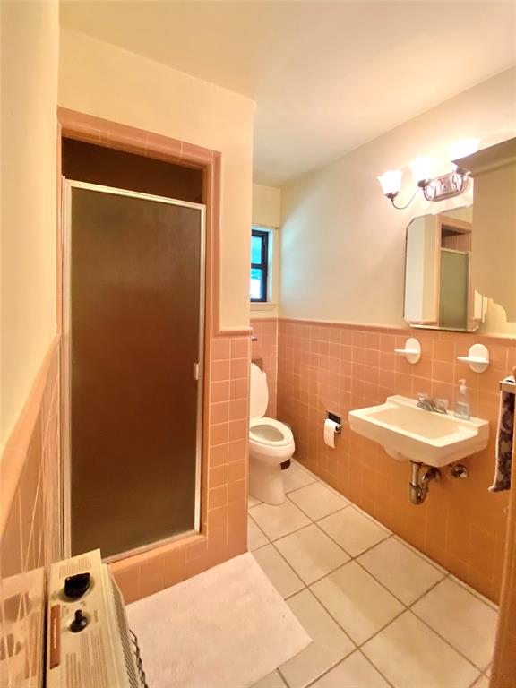 1605 Tolar Cemetery Road Tolar, TX 76476 - Photo 24 of 25 a bathroom with a sink a toilet and shower