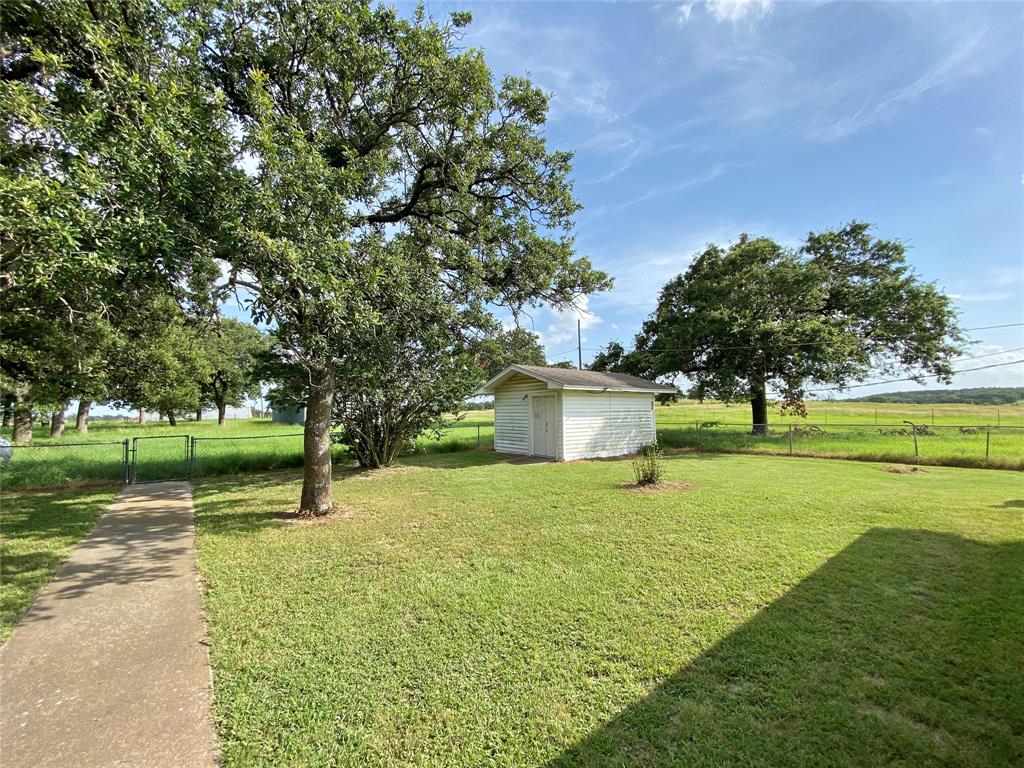 1605 Tolar Cemetery Road Tolar, TX 76476 - Photo 3 of 25 a house with huge green field in front of it