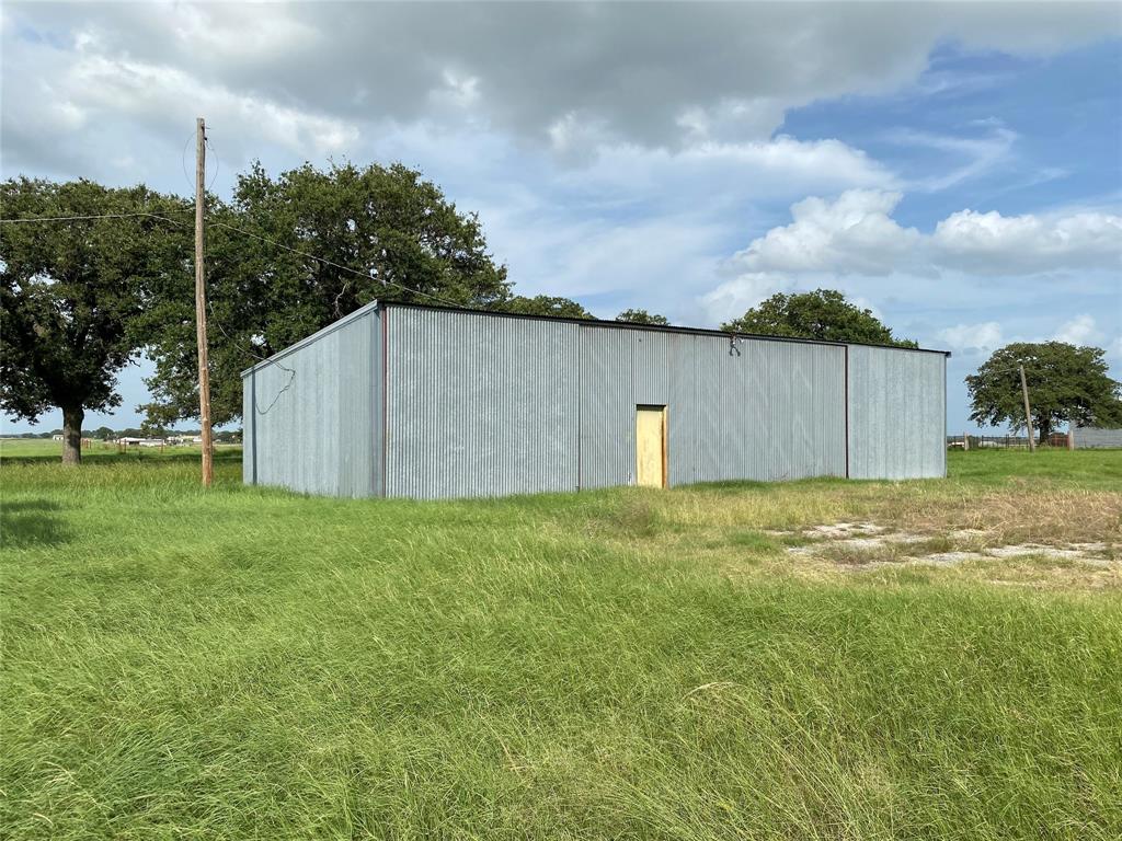 1605 Tolar Cemetery Road Tolar, TX 76476 - Photo 7 of 25 a backyard of a house