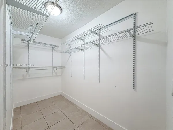 a view of a room with racks on the wall