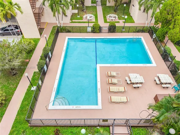swimming pool with an outdoor seating