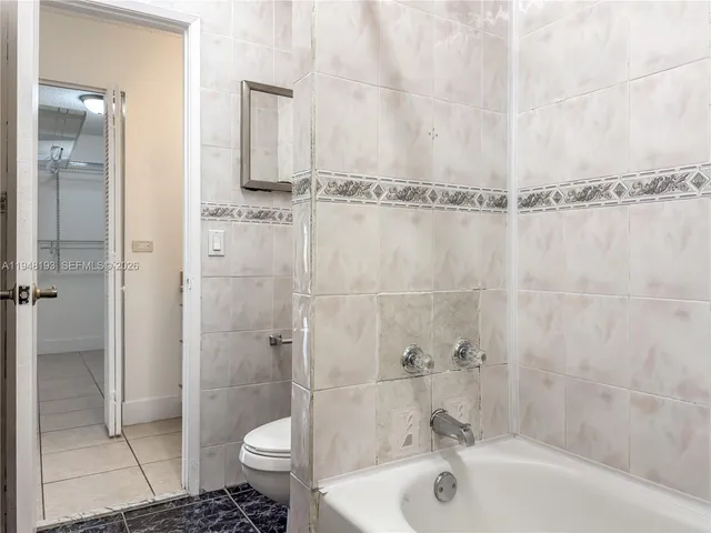 a bathroom with a sink and toilet